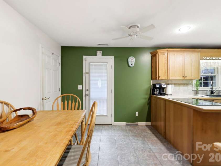 10687 Cruso Road, Canton, NC 28716.  MLS# CAR4423169, YatesRealty ID 50320. Dining area from living room