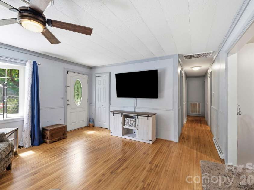 10687 Cruso Road, Canton, NC 28716.  MLS# CAR4423169, YatesRealty ID 50320. Living room