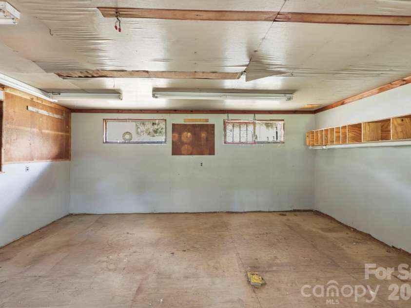 10687 Cruso Road, Canton, NC 28716.  MLS# CAR4423169, YatesRealty ID 50320. Storage off carport