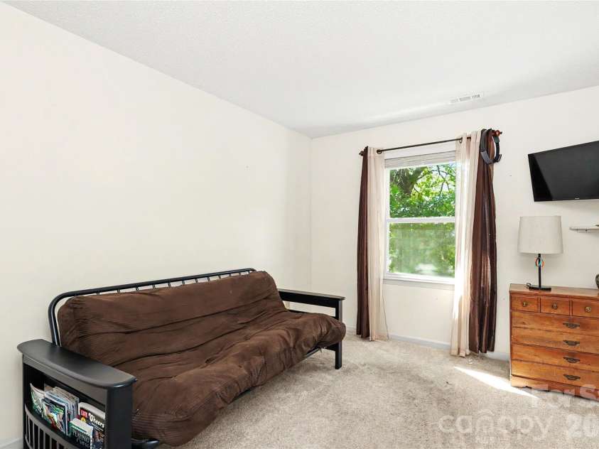7903 Long Nook Lane, Charlotte, NC 28277.  MLS# CAR4414616, YatesRealty ID 50326. Bedroom overlooks front yard. Neutral carpet