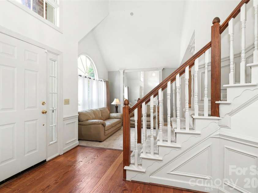 7903 Long Nook Lane, Charlotte, NC 28277.  MLS# CAR4414616, YatesRealty ID 50326. Sidelight at front door. Turned staircase