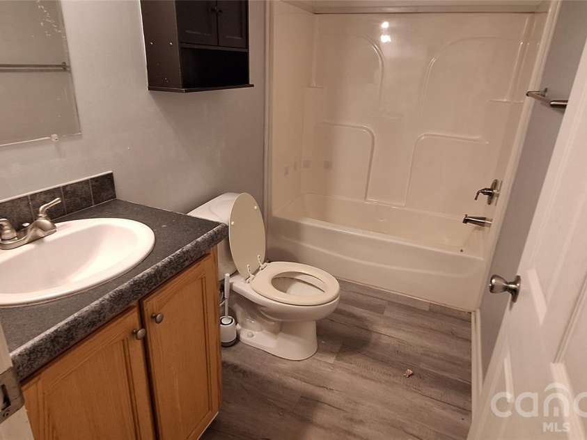 120 Otto Road, Cherryville, NC 28021.  MLS# CAR4411416, YatesRealty ID 50330. Hall bathroom