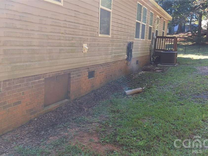 120 Otto Road, Cherryville, NC 28021.  MLS# CAR4411416, YatesRealty ID 50330. Rear yard