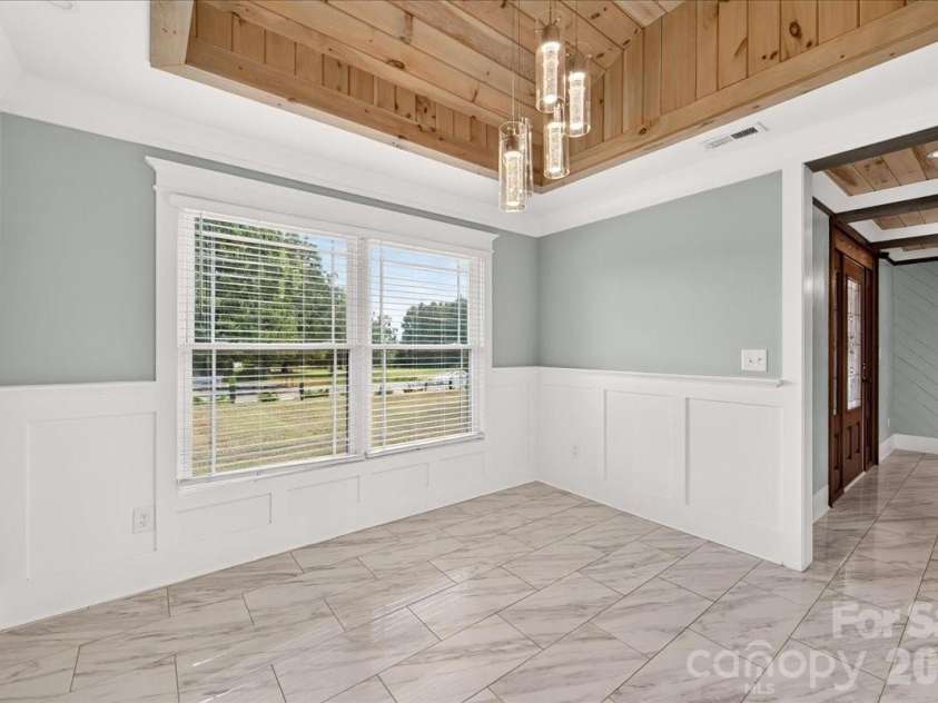 2519 Matthews Mint Hill Road, Matthews, NC 28105.  MLS# CAR4422836, YatesRealty ID 50334. 
