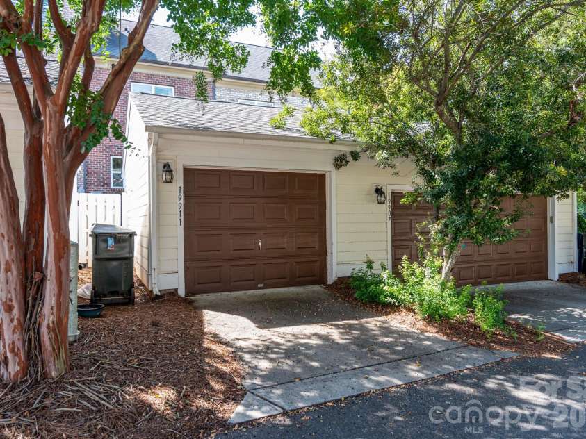 19911 Lamp Lighters Way, Cornelius, NC 28031.  MLS# CAR4422765, YatesRealty ID 50338. Entrance to Garage