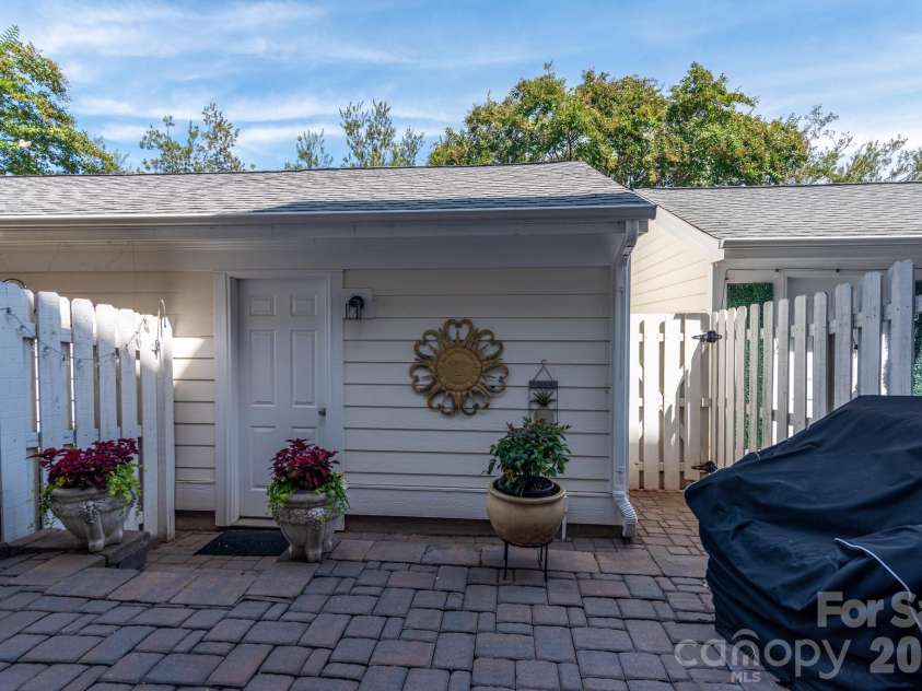 19911 Lamp Lighters Way, Cornelius, NC 28031.  MLS# CAR4422765, YatesRealty ID 50338. Outside Back Patio into detached garage