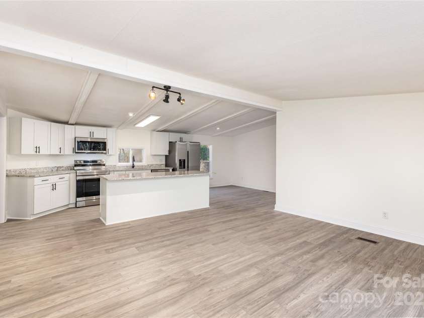 130 Old Lowesville Road, Stanley, NC 28164.  MLS# CAR4198589, YatesRealty ID 50343. Living Room