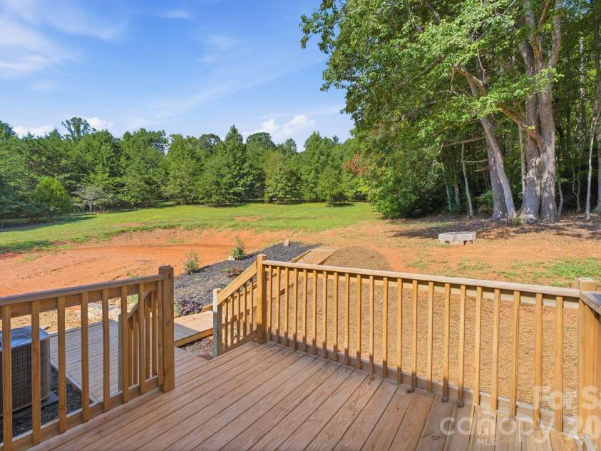 279 Rocky Top Acres Road, Ferguson, NC 28624.  MLS# CAR4423809, YatesRealty ID 50348. Rear deck