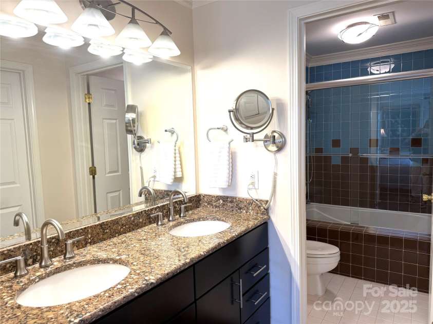 930 Jetton Street, Davidson, NC 28036.  MLS# CAR4309851, YatesRealty ID 5035. Primary bath with dual sinks and custom closet