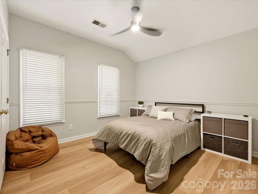 19706 Valiant Way, Cornelius, NC 28031.  MLS# CAR4423741, YatesRealty ID 50358. Additional secondary bedroom offers abundant natural light, generous space, and flexible functionality.