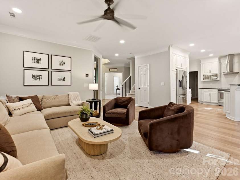 19706 Valiant Way, Cornelius, NC 28031.  MLS# CAR4423741, YatesRealty ID 50358. Bright open-concept floor plan features wood-look vinyl plank flooring and seamlessly connects the living room and updated kitchen.
