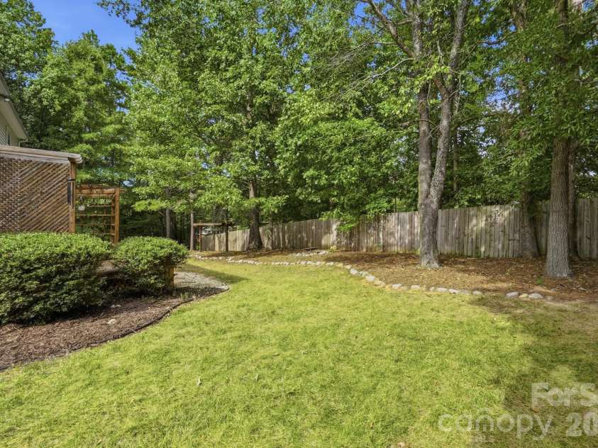 7202 Red Bush Court, Indian Trail, NC 28079.  MLS# CAR4417743, YatesRealty ID 50359. Back Yard