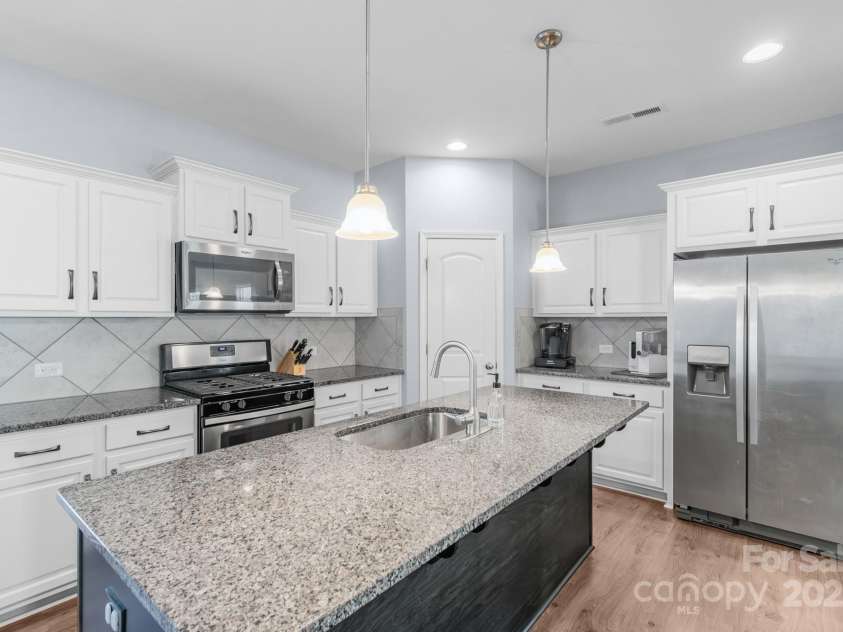 8028 Tricia Pointe Place, Indian Land, SC 29707.  MLS# CAR4225743, YatesRealty ID 5036. Big kitchen island