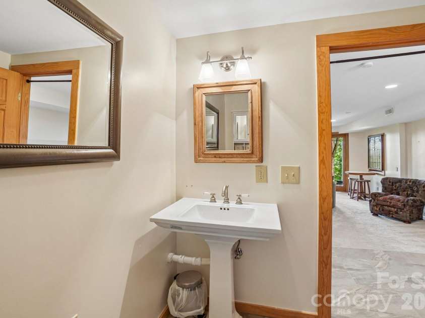 476 Waterford Drive, Maggie Valley, NC 28751.  MLS# CAR4423224, YatesRealty ID 50368. 2nd half bath