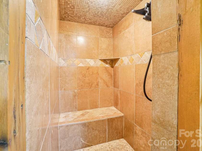 476 Waterford Drive, Maggie Valley, NC 28751.  MLS# CAR4423224, YatesRealty ID 50368. Ensuite tile shower