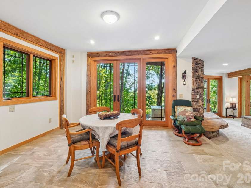 476 Waterford Drive, Maggie Valley, NC 28751.  MLS# CAR4423224, YatesRealty ID 50368. Lower Level dining game room