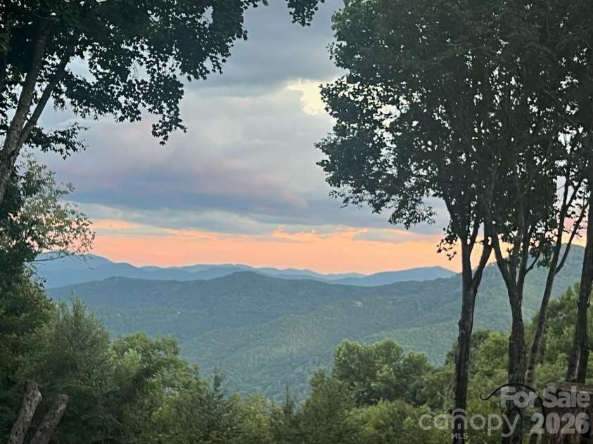 476 Waterford Drive, Maggie Valley, NC 28751.  MLS# CAR4423224, YatesRealty ID 50368. Sunset view