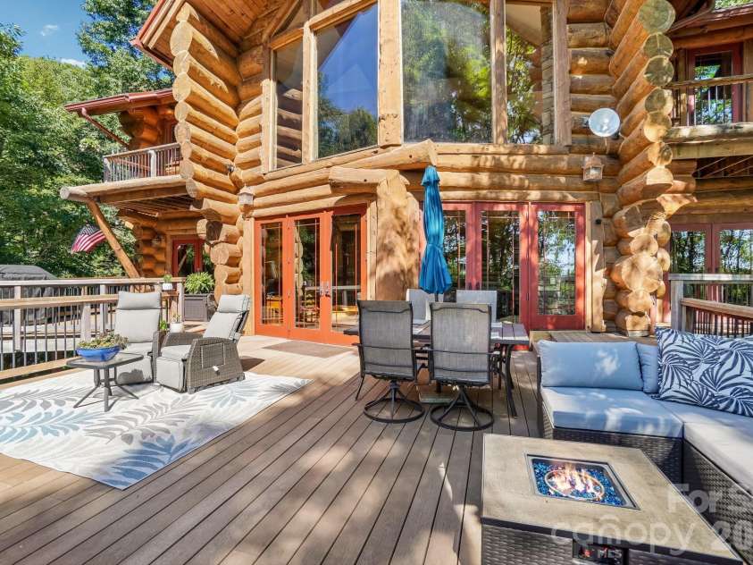 476 Waterford Drive, Maggie Valley, NC 28751.  MLS# CAR4423224, YatesRealty ID 50368. View deck impacted by the massive logs