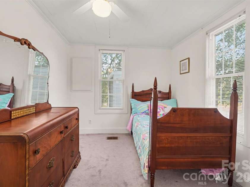 6002 White Store Road, Wingate, NC 28174.  MLS# CAR4420843, YatesRealty ID 50387. Downstairs Bedroom