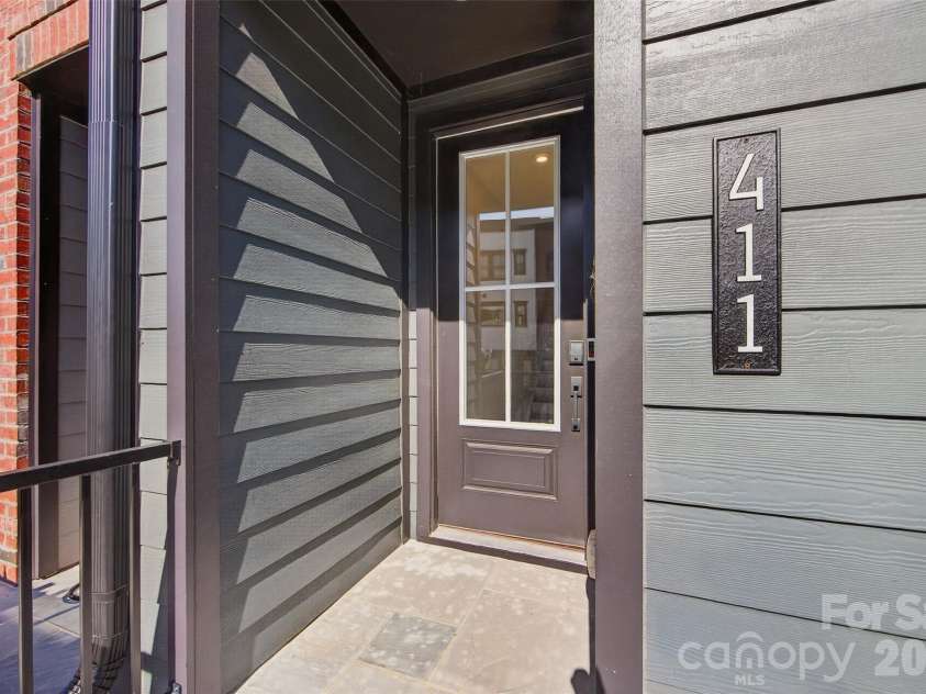 411 Old Town Village Road, Waxhaw, NC 28173.  MLS# CAR4423933, YatesRealty ID 50390. Covered front door
