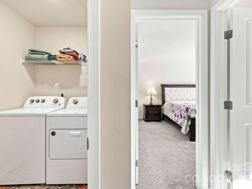 16 Madelyn Drive, Clyde, NC 28721.  MLS# CAR4423396, YatesRealty ID 50393. Laundry room on second level