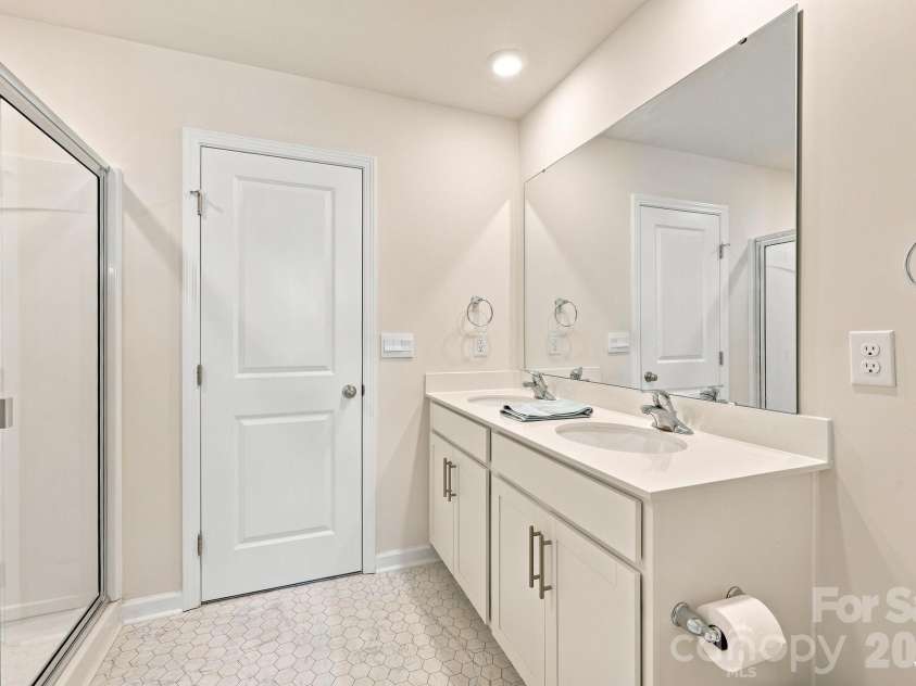 16 Madelyn Drive, Clyde, NC 28721.  MLS# CAR4423396, YatesRealty ID 50393. Master Bathroom