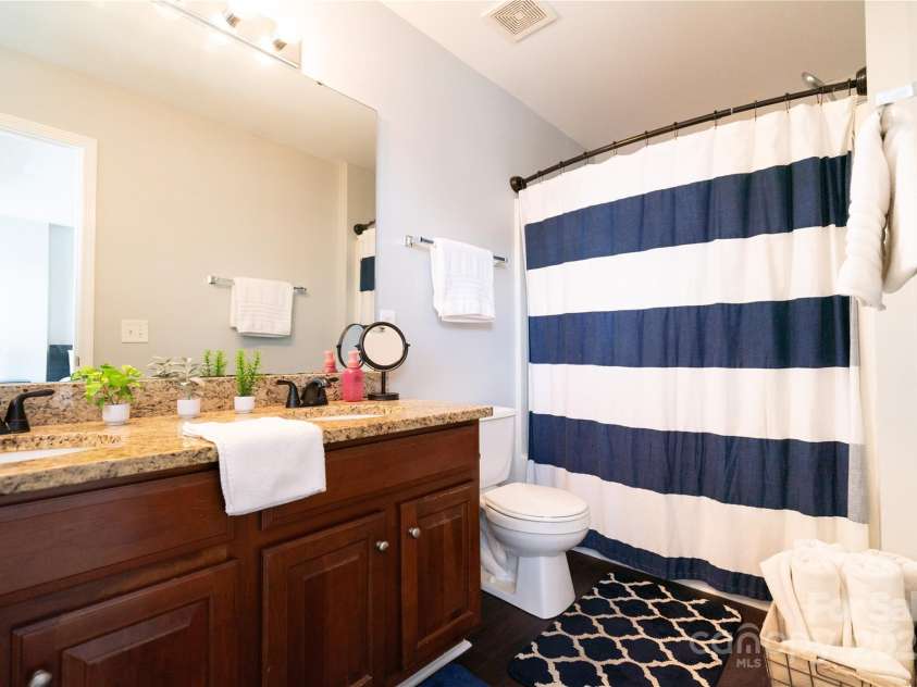 9511 Lina Ardrey Lane, Charlotte, NC 28277.  MLS# CAR4269974, YatesRealty ID 504. Ensuite primary bathroom