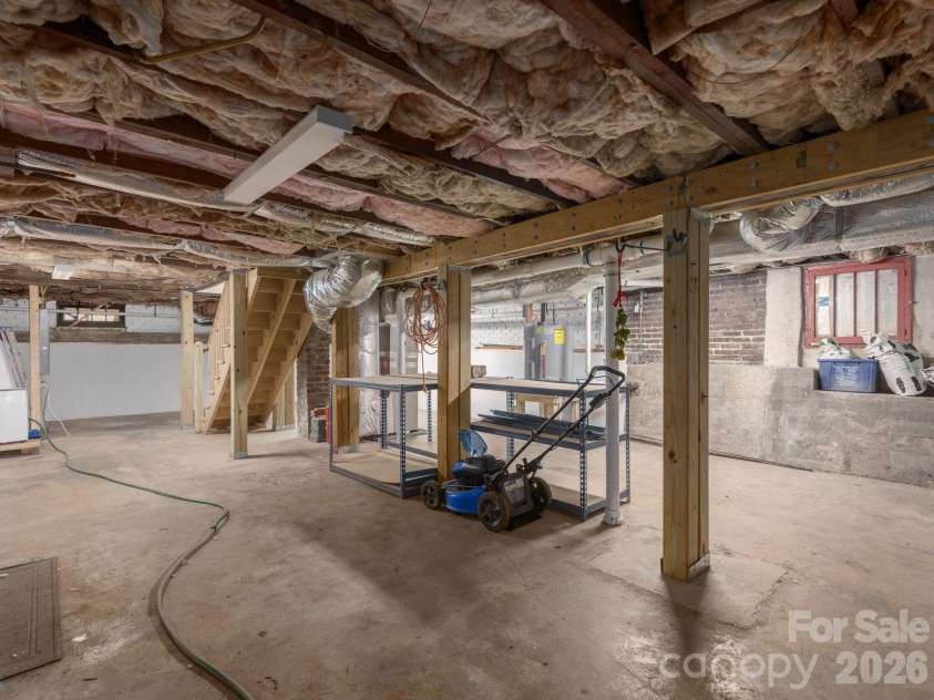 57 Mitchell Avenue, Asheville, NC 28806.  MLS# CAR4356642, YatesRealty ID 5040. Spacious basement for storage