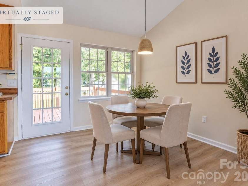 1209 Moss Acres Court, Kannapolis, NC 28081.  MLS# CAR4423583, YatesRealty ID 50400. Dining area *AI-enhanced