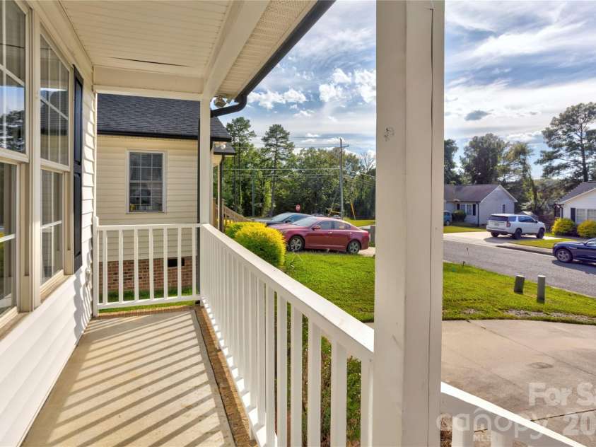 1209 Moss Acres Court, Kannapolis, NC 28081.  MLS# CAR4423583, YatesRealty ID 50400. Lovely Covered Front Porch
