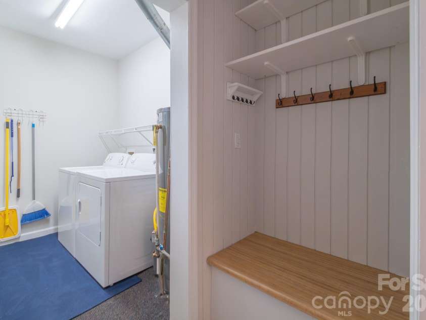 643 Seneca Place, Charlotte, NC 28210.  MLS# CAR4354130, YatesRealty ID 5041. Drop zone and laundry room from carport