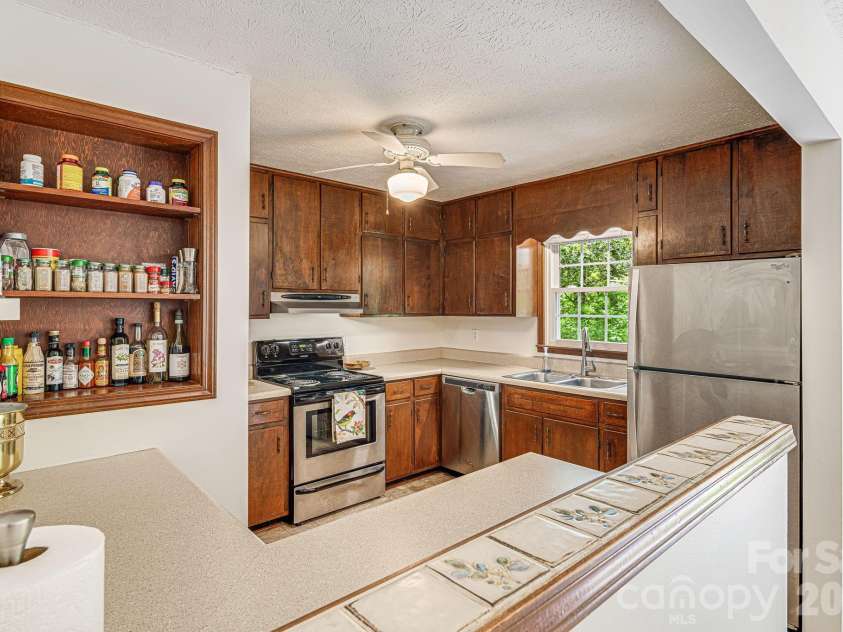 61 Spring Cove Drive, Brevard, NC 28712.  MLS# CAR4355837, YatesRealty ID 5042. 