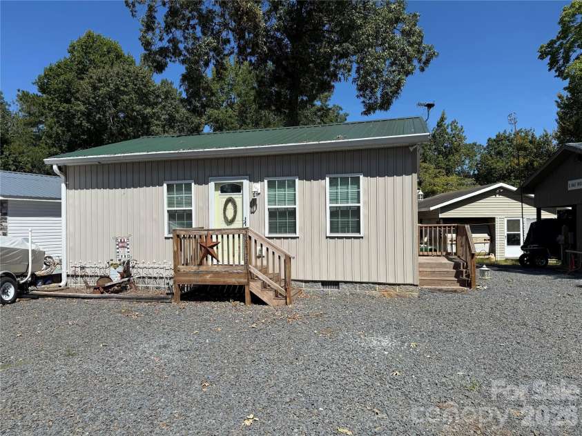 222 Lake Tillery Trail, Mount Gilead, NC 27306.  MLS# CAR4423632, YatesRealty ID 50441. 