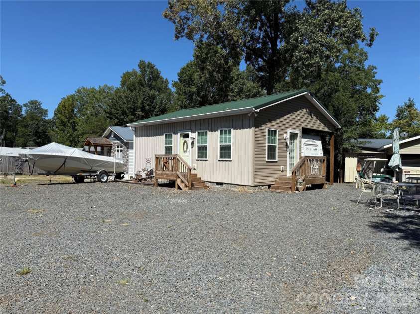 222 Lake Tillery Trail, Mount Gilead, NC 27306.  MLS# CAR4423632, YatesRealty ID 50441. 