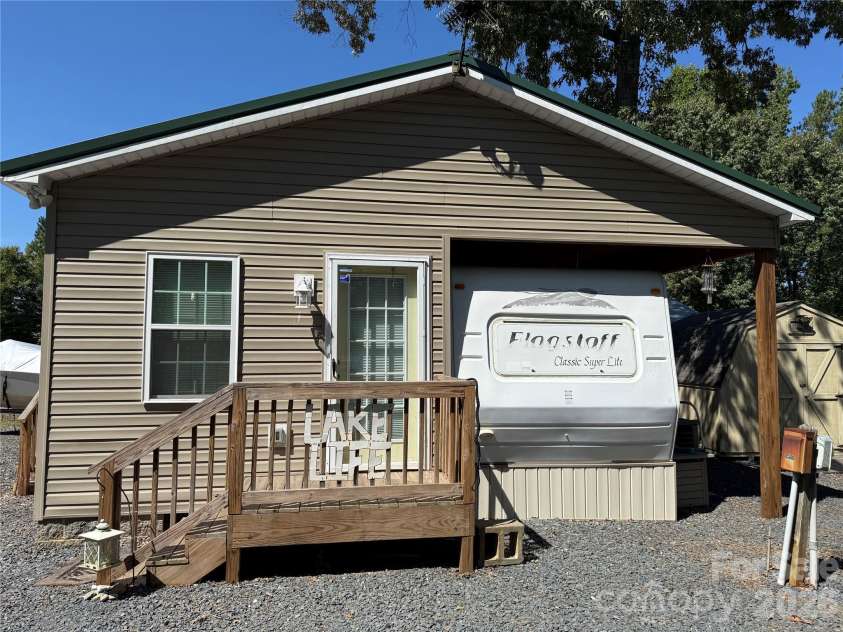 222 Lake Tillery Trail, Mount Gilead, NC 27306.  MLS# CAR4423632, YatesRealty ID 50441. 