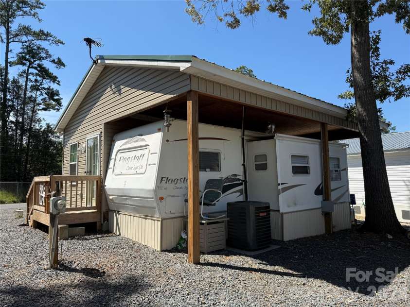 222 Lake Tillery Trail, Mount Gilead, NC 27306.  MLS# CAR4423632, YatesRealty ID 50441. 