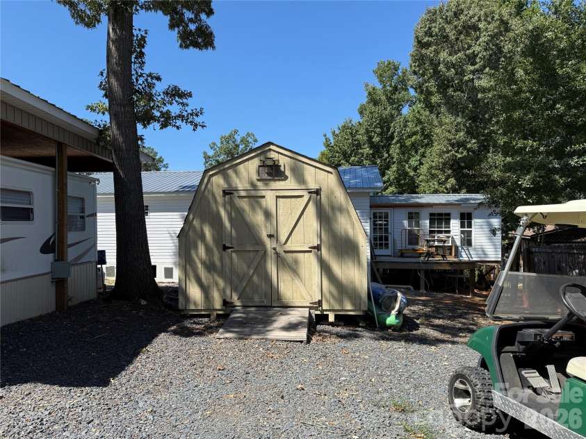 222 Lake Tillery Trail, Mount Gilead, NC 27306.  MLS# CAR4423632, YatesRealty ID 50441. 