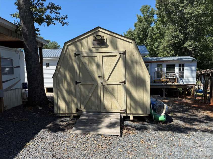 222 Lake Tillery Trail, Mount Gilead, NC 27306.  MLS# CAR4423632, YatesRealty ID 50441. 