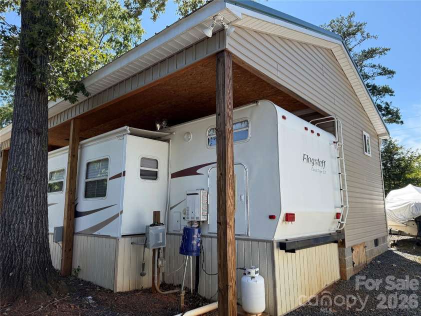 222 Lake Tillery Trail, Mount Gilead, NC 27306.  MLS# CAR4423632, YatesRealty ID 50441. 
