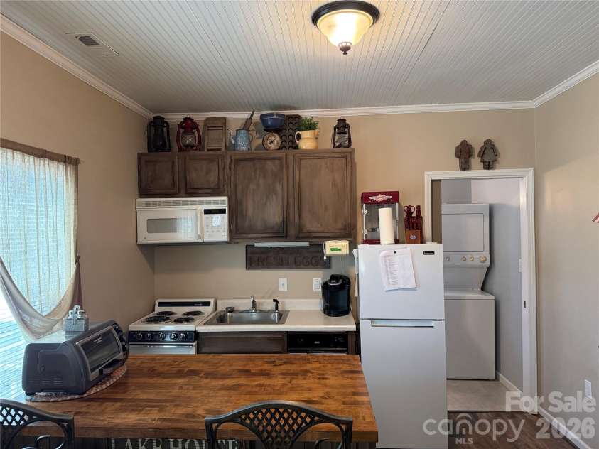 222 Lake Tillery Trail, Mount Gilead, NC 27306.  MLS# CAR4423632, YatesRealty ID 50441. 