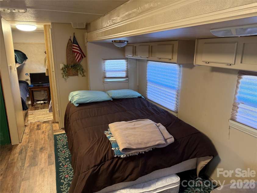 222 Lake Tillery Trail, Mount Gilead, NC 27306.  MLS# CAR4423632, YatesRealty ID 50441. 