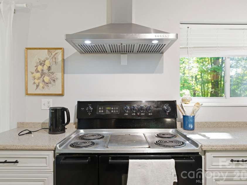 97 Walter McNeely Road, Sapphire, NC 28774.  MLS# CAR4424019, YatesRealty ID 50451. 