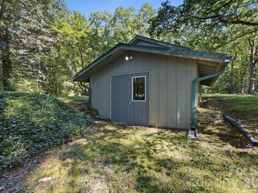 97 Walter McNeely Road, Sapphire, NC 28774.  MLS# CAR4424019, YatesRealty ID 50451. 