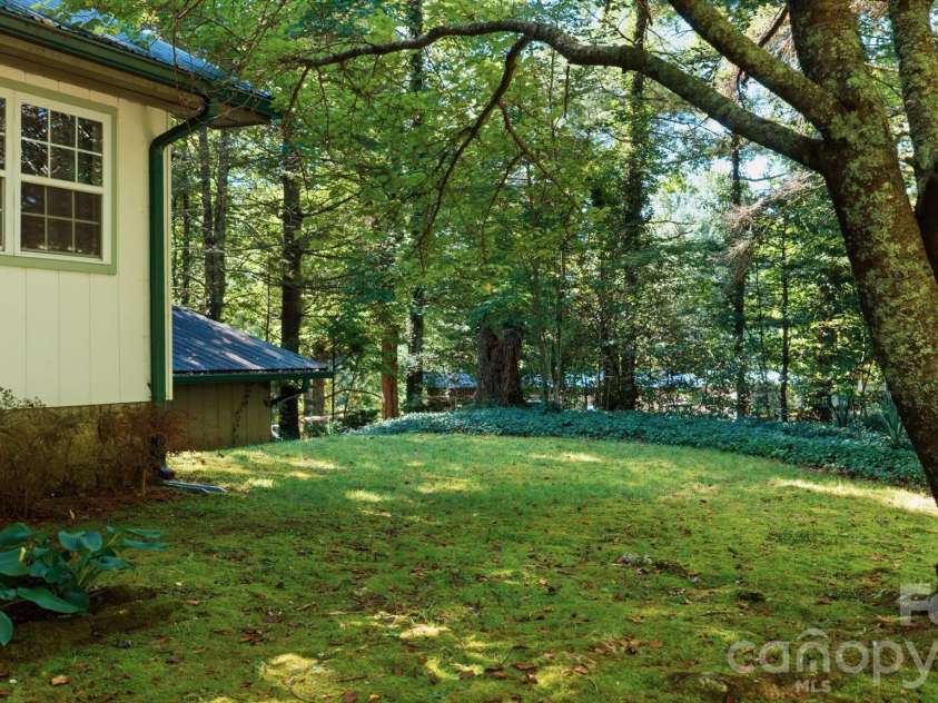 97 Walter McNeely Road, Sapphire, NC 28774.  MLS# CAR4424019, YatesRealty ID 50451. 