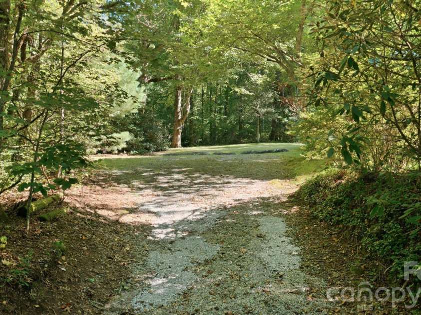 97 Walter McNeely Road, Sapphire, NC 28774.  MLS# CAR4424019, YatesRealty ID 50451. 