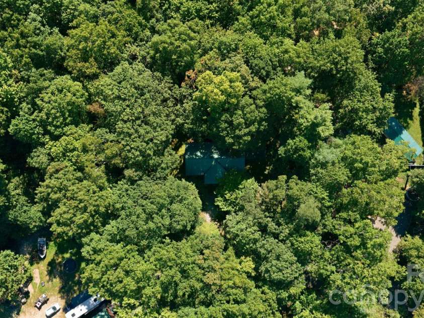 97 Walter McNeely Road, Sapphire, NC 28774.  MLS# CAR4424019, YatesRealty ID 50451. 