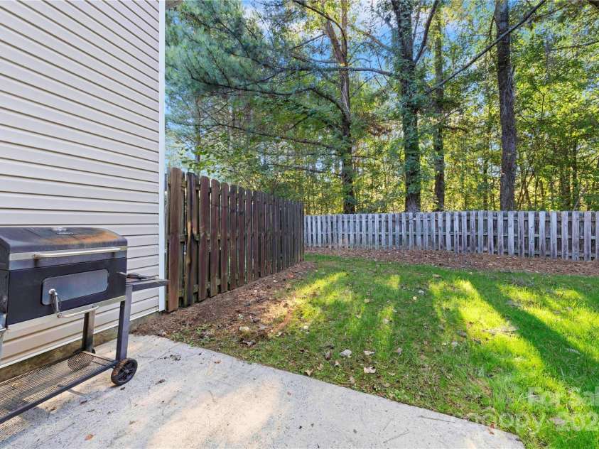 2038 University Heights Lane, Charlotte, NC 28213.  MLS# CAR4190741, YatesRealty ID 5046. Patio & Back Yard