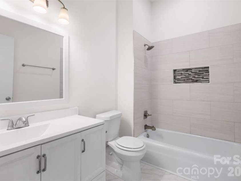 4309 Hovis Road, Charlotte, NC 28208.  MLS# CAR4420478, YatesRealty ID 50467. Hall Bathroom