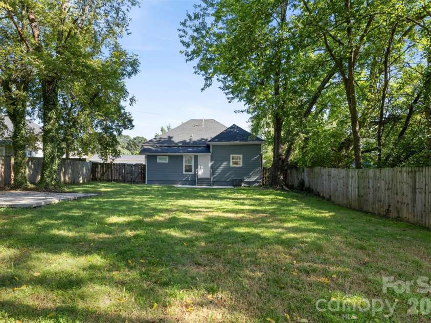 4309 Hovis Road, Charlotte, NC 28208.  MLS# CAR4420478, YatesRealty ID 50467. Large Flat Backyard!