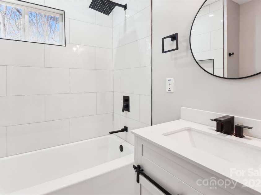 1105 Stanback Road, Chester, SC 29706.  MLS# CAR4212458, YatesRealty ID 5047. Spacious bathroom with modern fixtures and ample lighting.